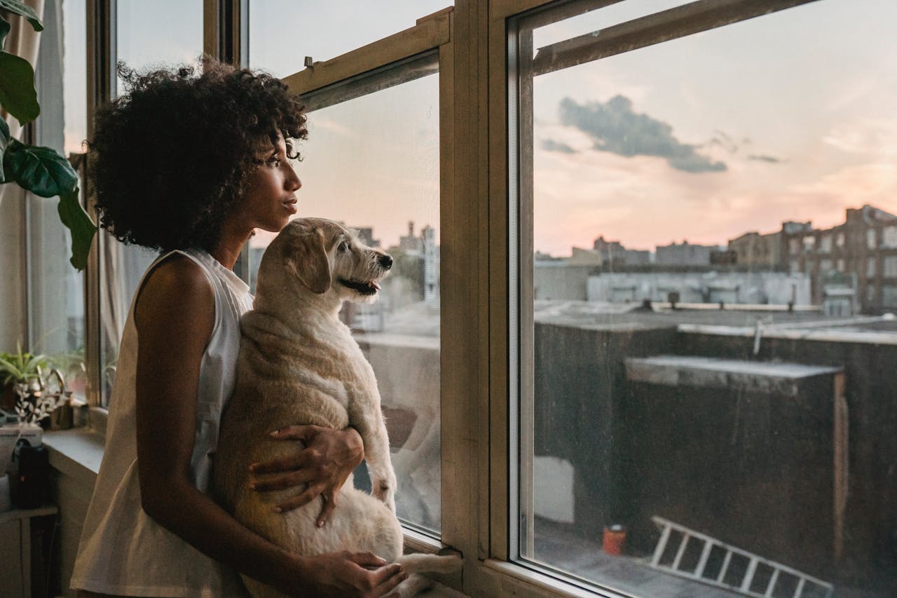 Pet Insurance - Black woman with dog